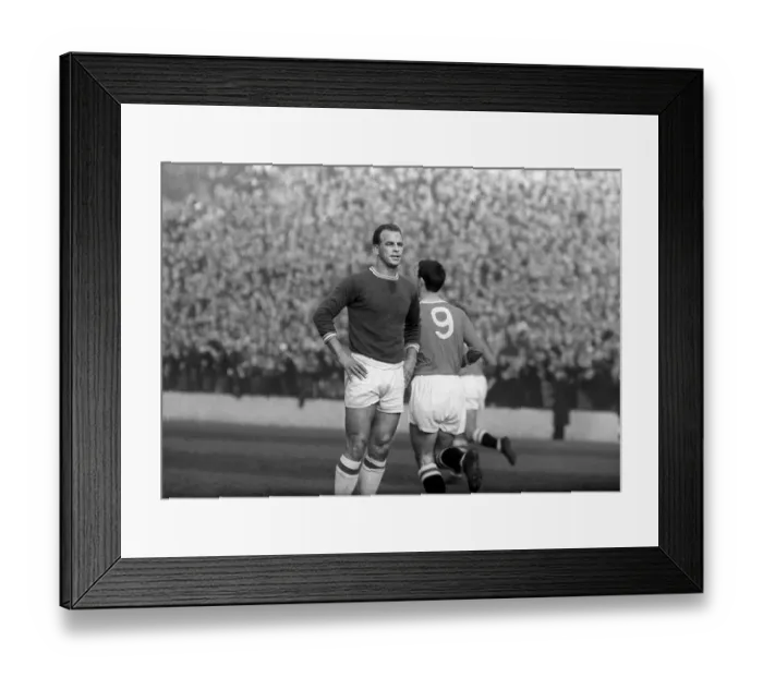 Framed Print : John Charles of Cardiff City looking pensive after Eddie Firmani scored for Charlton