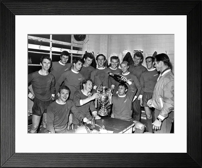 Framed Print : Cardiff City players celebrate with champagne after they had won the Welsh Cup at Ninian Framed Print : Cardiff City players celebrate with champagne after they had won the Welsh Cup at Ninian