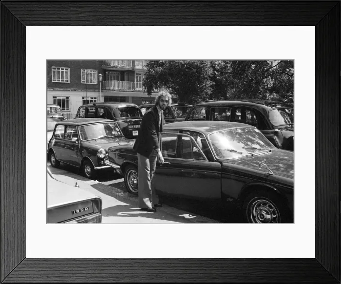 Framed Print : Charlie George signs for Derby County at a London hotel