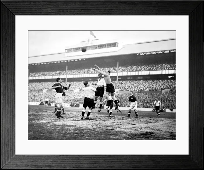 Framed Print : The German goalkeeper, Jacob, in action against England in an international football Framed Print : The German goalkeeper, Jacob, in action against England in an international football