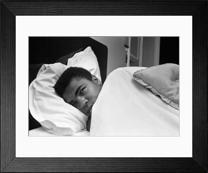 Framed Print : Cassius Clay aka (Muhammad Ali) catches up on some sleep in the Piccadilly Hotel Framed Print : Cassius Clay aka (Muhammad Ali) catches up on some sleep in the Piccadilly Hotel