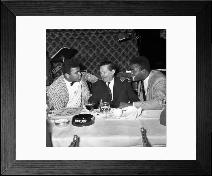 Framed Print : Cassius Clay aka (Muhammad Ali) meets Peter Wilson (centered) at Isow Framed Print : Cassius Clay aka (Muhammad Ali) meets Peter Wilson (centered) at Isow