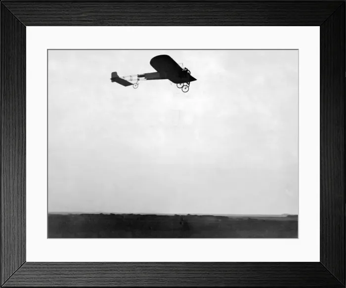 Framed Print : The historic crossing of the English Channel by French aviator Louis Bleriot in his Framed Print : The historic crossing of the English Channel by French aviator Louis Bleriot in his