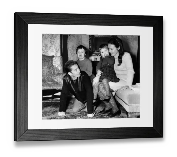 Framed Print : Lester Piggott plays horse for daughter Maureen at his home while his wife, Susan Framed Print : Lester Piggott plays horse for daughter Maureen at his home while his wife, Susan