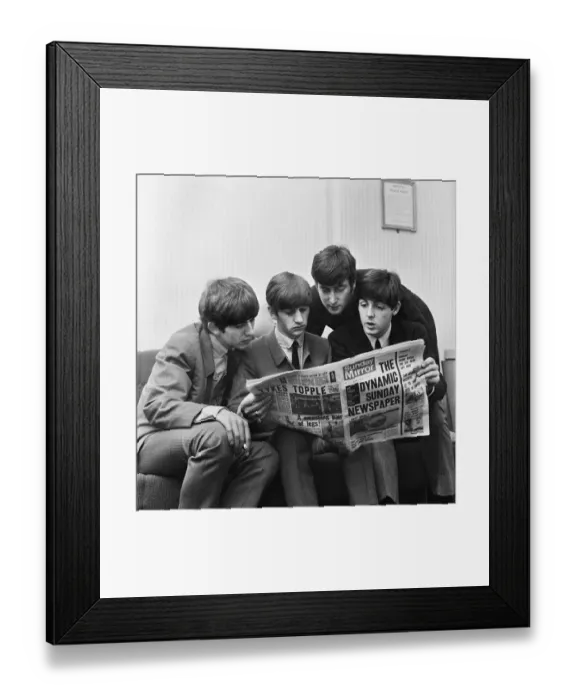 Framed Print : The Beatles, sit down to read the latest issue of The Sunday Mirror Newspaper