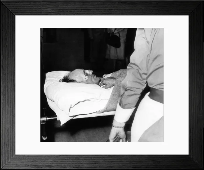 Framed Print : Jockey Arthur Scobie'Breasley arriving at a London Clinic on a stretcher Framed Print : Jockey Arthur Scobie'Breasley arriving at a London Clinic on a stretcher