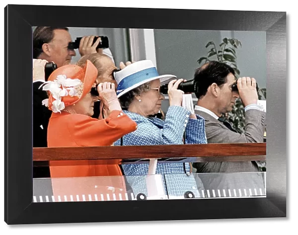 Queen Elizabeth II enjoying the races at Epsom Derby with the Queen Mother