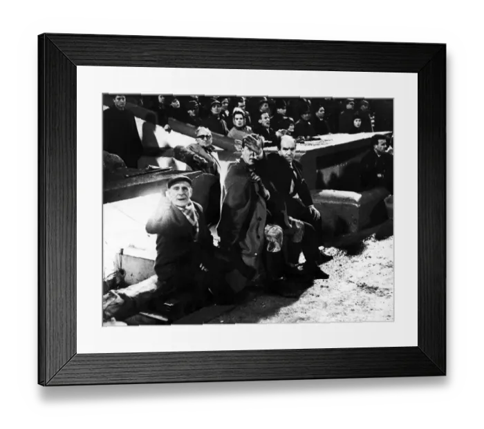 Framed Print : Cardiff City manager Jimmy Scoular tries to hide the face of City centre half Don Murray Framed Print : Cardiff City manager Jimmy Scoular tries to hide the face of City centre half Don Murray