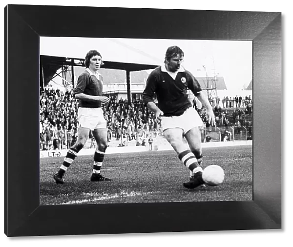 Cardiff City legend Richie Morgan, pictured during a game watched by Albert Larmour in