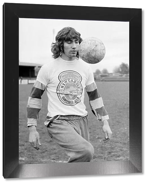 Hayes striker Robin Friday wearing a Newcastle Brown Ale t-shirt during a training sesion