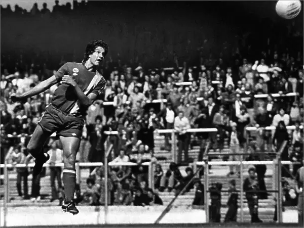 Cardiff City ss Welsh international defender Phil Dwyer leaps to head home