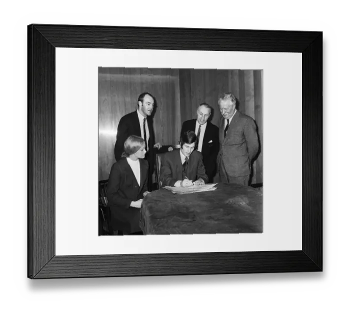 Framed Print : Liverpools new signing John Toshack from Cardiff City signs his contract accompanied