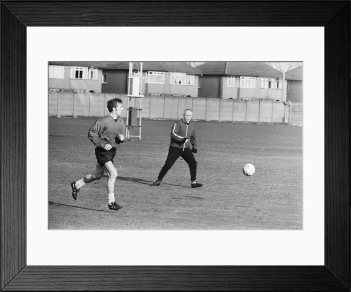 Framed Print : Liverpool manager Bill Shankly keeps a close eye on Liverpool forward Peter Thompson as Framed Print : Liverpool manager Bill Shankly keeps a close eye on Liverpool forward Peter Thompson as