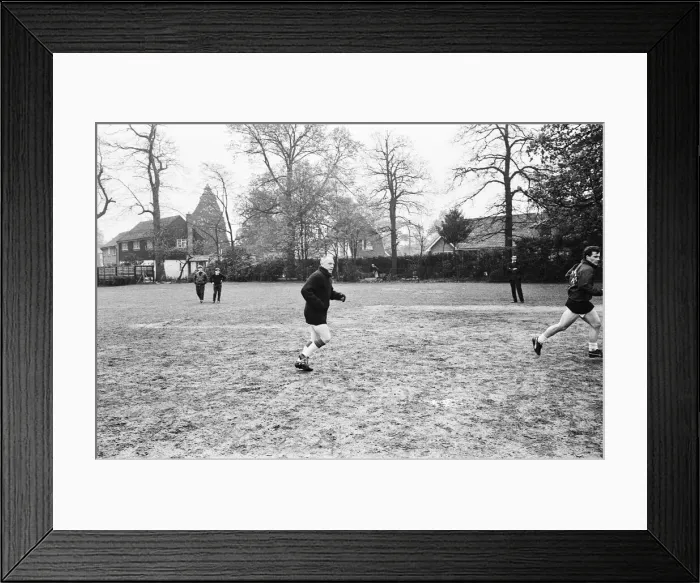 Framed Print : Liverpool manager Bill Shankly takes charge of a team training session at Weybridge one Framed Print : Liverpool manager Bill Shankly takes charge of a team training session at Weybridge one