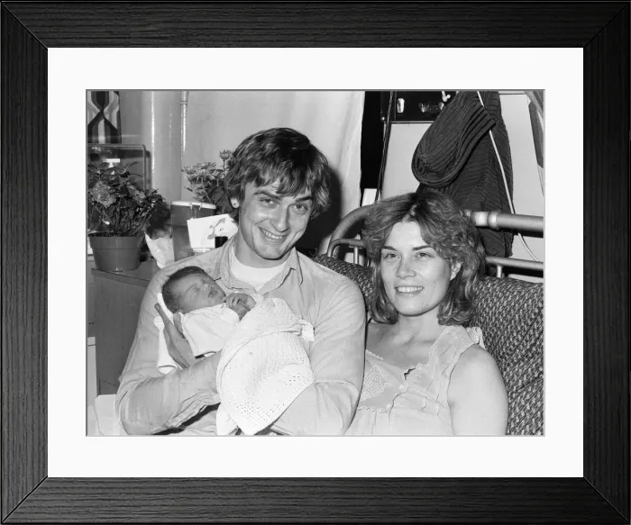 Framed Print : Mike Oldfield, musician and composer, pictured with newborn baby daughter Molly Framed Print : Mike Oldfield, musician and composer, pictured with newborn baby daughter Molly