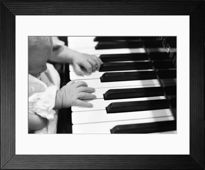 Framed Print : Mike Oldfield, musician and composer, pictured at home with family, baby son Dougal Framed Print : Mike Oldfield, musician and composer, pictured at home with family, baby son Dougal