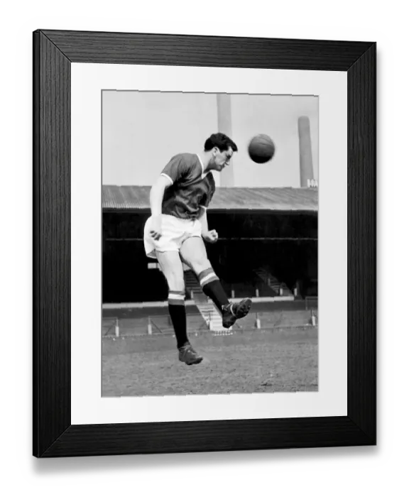Framed Print : Manchester United footballer Tommy Taylor in heading practice at Old Trafford, circa 1957