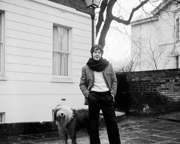 Paul McCartney seen here outside his home in St Johns Wood with his dog Martha