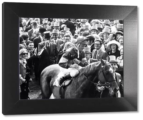 Racehorse Grundy and jockey Pat Eddery are led in after winning The Derby at Epsom