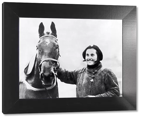 Famous racehorse Golden Miller with owner Dorothy Paget after winning the 1934 Grand
