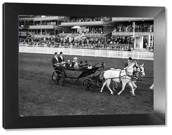 King George V and Queen Mary arrive at Ascot in horse drawn carriage with white horses