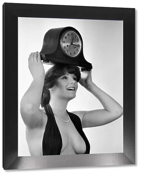 Model reminding people to put their clocks back by one hour at the end of British Summer