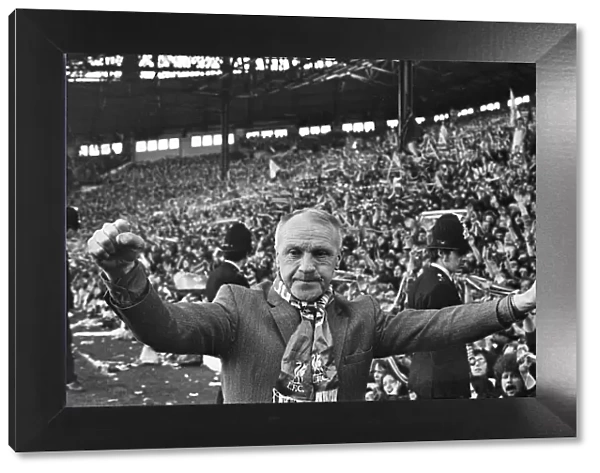 Liverpool manager Bill Shankly celebrates as his side become League champions following