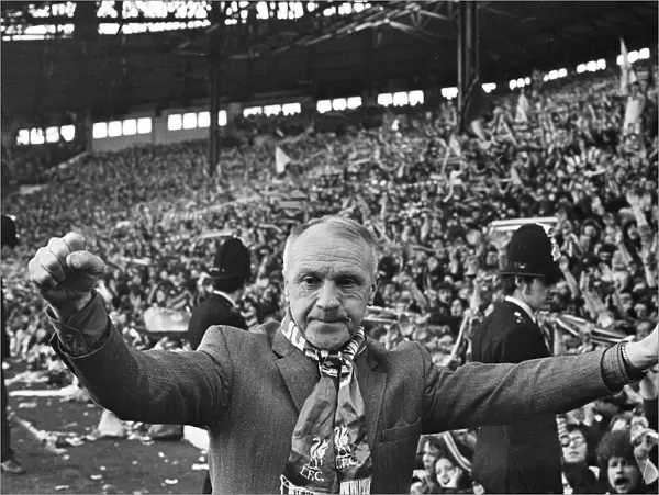 Liverpool manager Bill Shankly celebrates as his side become League champions following