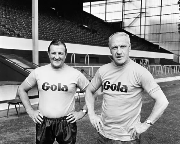 Former Liverpool manager Bill Shankly poses with new manager Bob Paisley at Anfield
