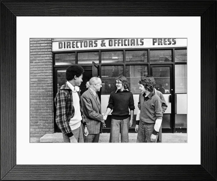 Framed Print : Liverpool manager Bill Shankly greets young fans outside the director