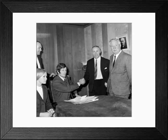 Framed Print : Liverpools new signing John Toshack from Cardiff City signs his contract accompanied