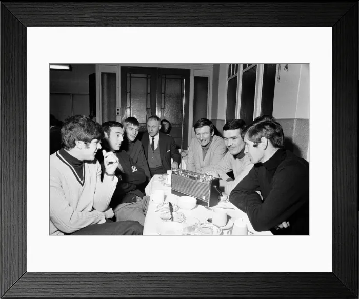 Framed Print : Liverpool manager Bill Shankly listening to the FA Cup draw with some of his players over Framed Print : Liverpool manager Bill Shankly listening to the FA Cup draw with some of his players over
