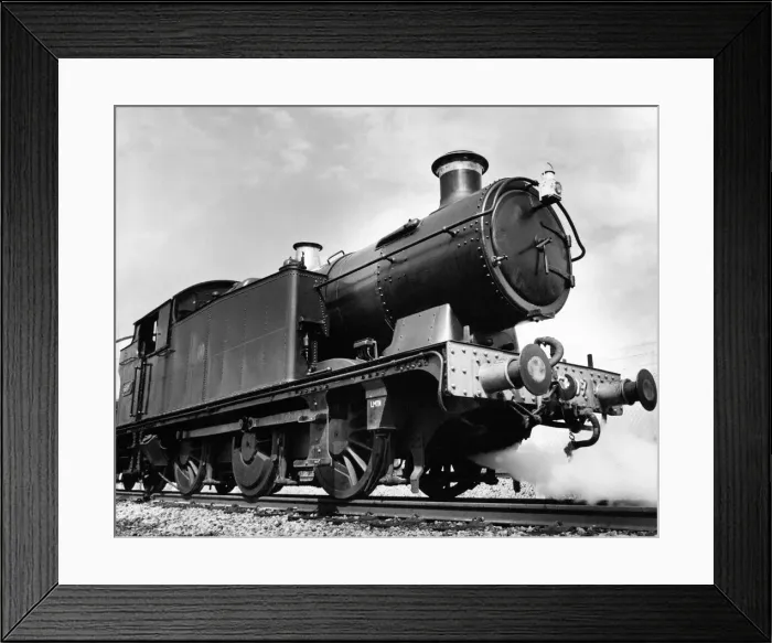 Framed Print : An old Leamington steam locomotive number 6697 being preapred for action at Didcot Framed Print : An old Leamington steam locomotive number 6697 being preapred for action at Didcot