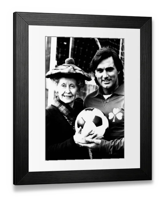 Framed Print : Lib - Football legend George Best giving actress Gudrun Ure some footballing tips during Framed Print : Lib - Football legend George Best giving actress Gudrun Ure some footballing tips during