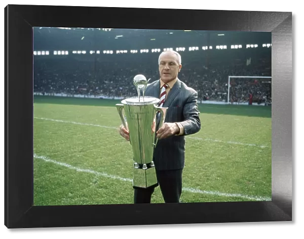 Liverpool manager Bill Shankly receives the Bells Whisky Trophy for Manager of the Year