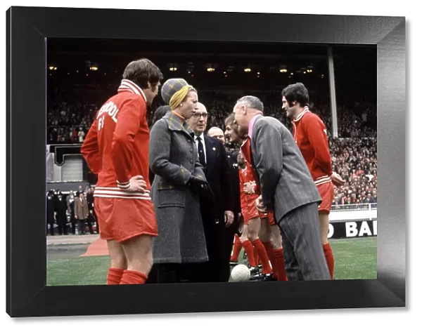 Liverpool manager Bill Shankly shakes hands with Princess Anne at Wembley Stadium before