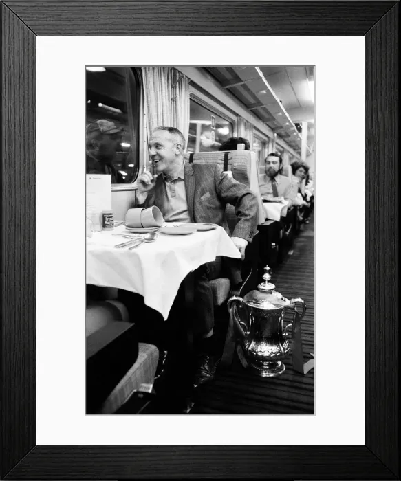Framed Print : Liverpool manager Bill Shankly with the FA Cup trophy on board the train back to Framed Print : Liverpool manager Bill Shankly with the FA Cup trophy on board the train back to