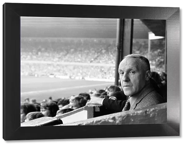 Liverpool manager Bill Shankly watching his team in action from the stands, April 1974
