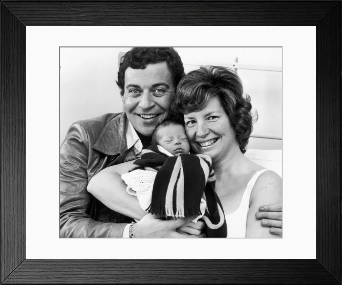 Framed Print : Birmingham Comedian, David Ismay and his wife show off their new baby