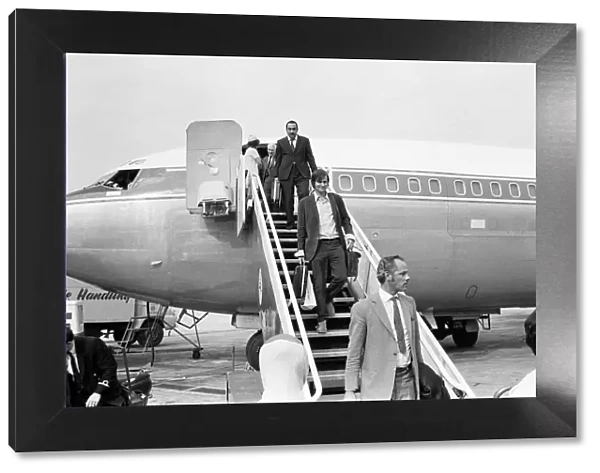 Kent Gavin, Daily Mirror Staff Photographer, steps off aeroplane at London Heathrow