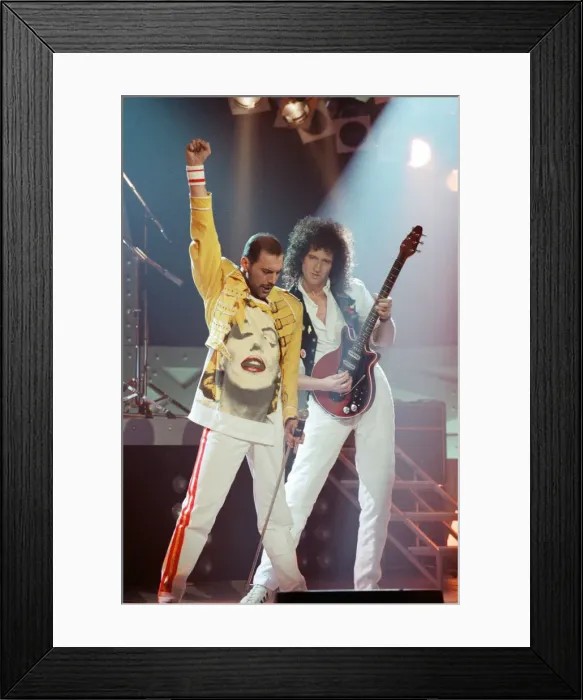Framed Print : Queen rock group performing. Singer Freddie Mercury with guitarist Brian May Framed Print : Queen rock group performing. Singer Freddie Mercury with guitarist Brian May
