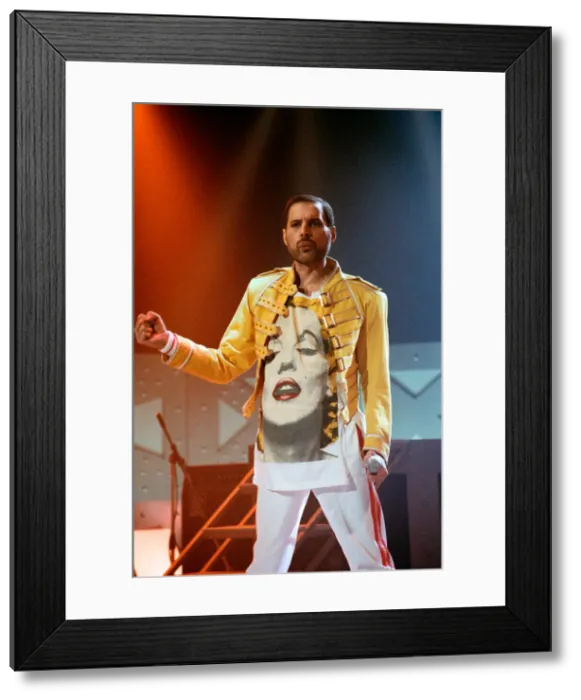 Framed Print : Queen rock group performing. Singer Freddie Mercury on stage