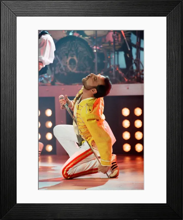 Framed Print : Queen rock group performing. Singer Freddie Mercury on stage Framed Print : Queen rock group performing. Singer Freddie Mercury on stage