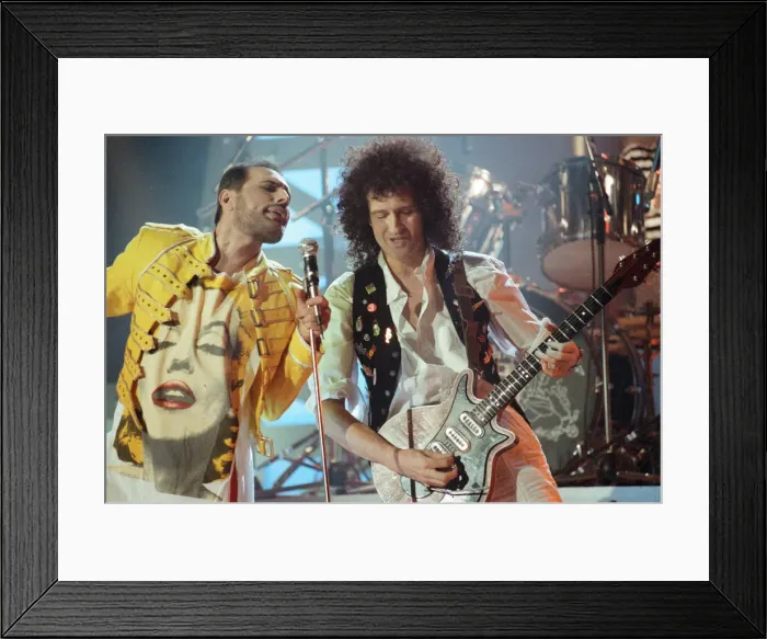 Framed Print : Queen rock group performing. Singer Freddie Mercury with guitarist Brian May Framed Print : Queen rock group performing. Singer Freddie Mercury with guitarist Brian May