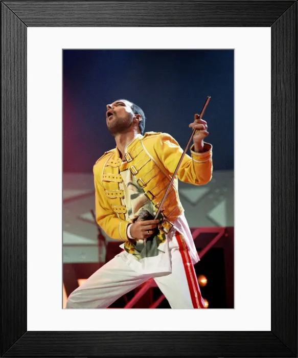 Framed Print : Queen rock group performing. Singer Freddie Mercury on stage Framed Print : Queen rock group performing. Singer Freddie Mercury on stage