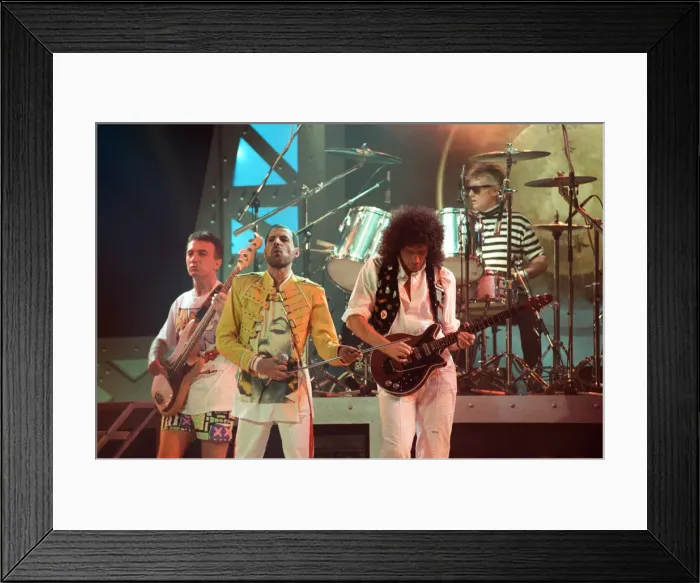 Framed Print : Queen rock group performing. Singer Freddie Mercury with guitarist Brian May Framed Print : Queen rock group performing. Singer Freddie Mercury with guitarist Brian May