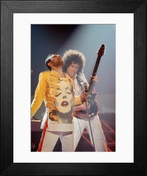Framed Print : Queen rock group performing. Singer Freddie Mercury with guitarist Brian May Framed Print : Queen rock group performing. Singer Freddie Mercury with guitarist Brian May