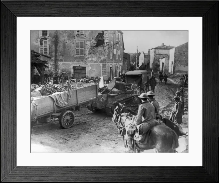 Framed Print : Two US Army calvalrymen seen here watching a Renault FT light tanks towing a truck loaded Framed Print : Two US Army calvalrymen seen here watching a Renault FT light tanks towing a truck loaded