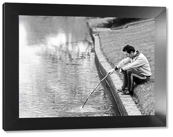 Brian Clough Nottingham Forest manager sitting on the river bank thinking
