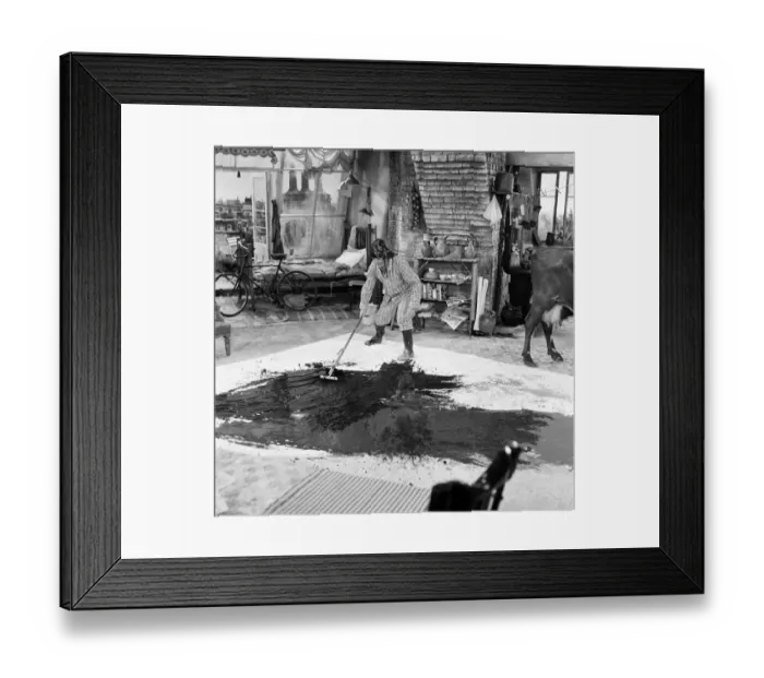 Framed Print : Tony Hancock rides a bike around the set as he films The Rebel at Elstree